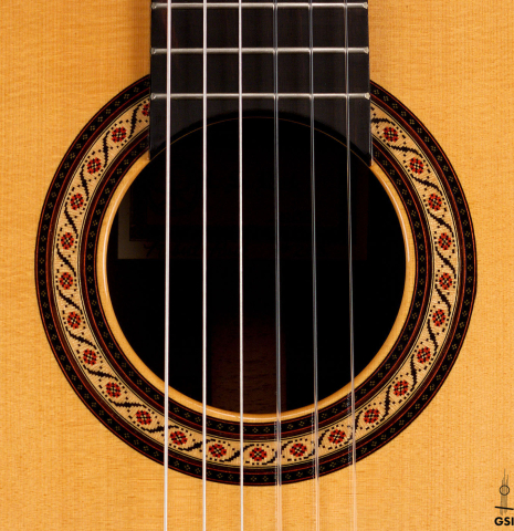 The rosette of a 1983 Robert Ruck classical guitar made of spruce and CSA rosewood The rosette of a 1983 Robert Ruck classical guitar made of spruce and CSA rosewood