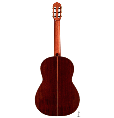 The back of a 2000 Robert Ruck classical guitar made with cedar and Indian rosewood on a white background