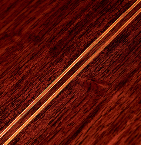 Closeup of back center seam purfling of a 2000 Robert Ruck classical guitar made with cedar and Indian rosewood