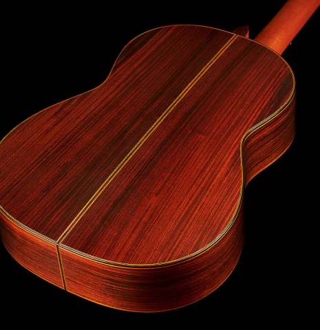The back and sides of a 2000 Robert Ruck classical guitar made of spruce and Indian rosewood