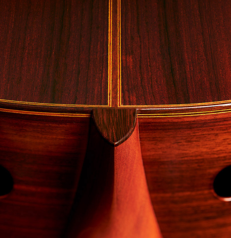 The back, heel, sides and dual sounports of a 2000 Robert Ruck classical guitar made of spruce and Indian rosewood