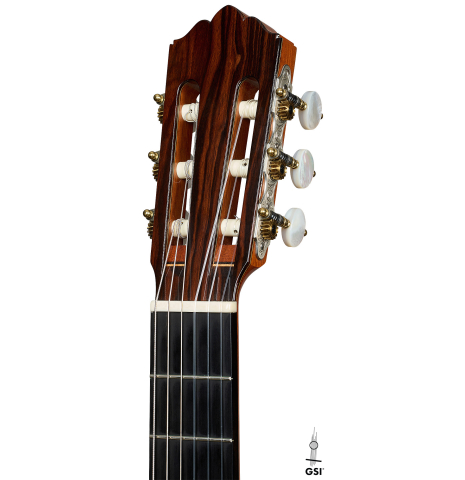 The headstock of a 2003 Robert Ruck classical guitar made of spruce and Indian rosewood