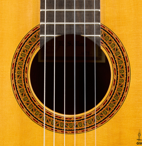 The rosette of a 1979 Robert Ruck classical guitar made of spruce and CSA rosewood