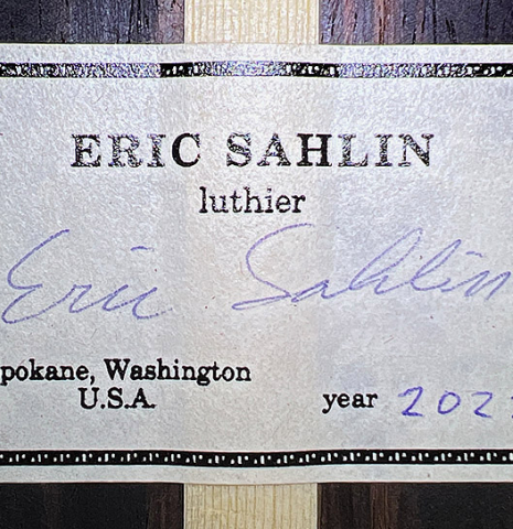 The label of a 2022 Eric Sahlin made of cedar and CSA rosewood