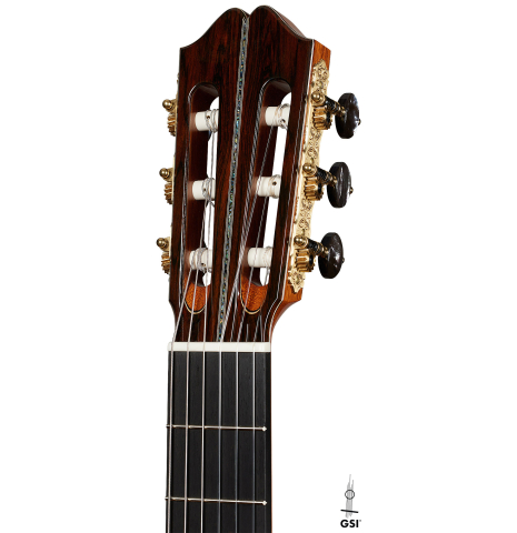The headstock of a 2024 Eric Sahlin classical guitar made of cedar and CSA rosewood