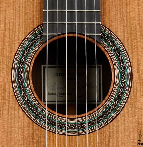 The rosette of a 2024 Eric Sahlin classical guitar made of cedar and CSA rosewood