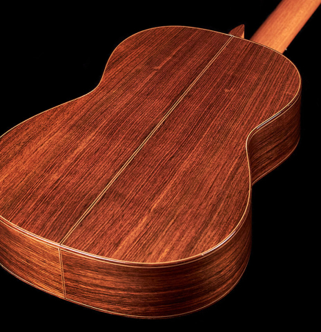 The back of a 1994 Eric Sahlin classical guitar made of cedar and Indian rosewood.