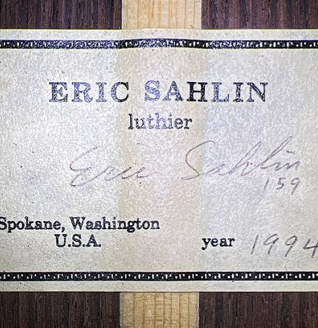 The label of a 1994 Eric Sahlin classical guitar made of cedar and Indian rosewood.