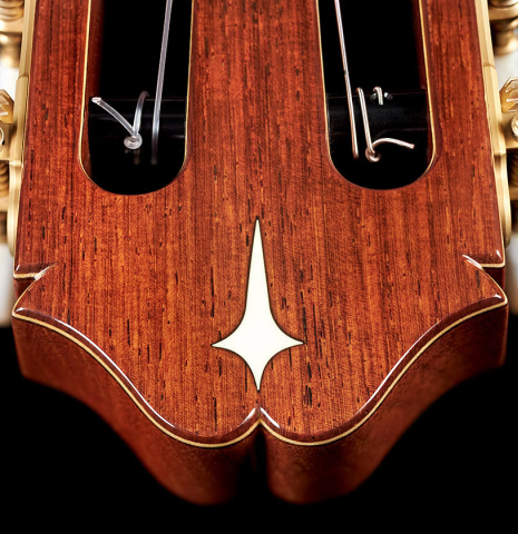 The headstock with inlay of a 2023 Masaki Sakurai "PC" classical guitar made with spruce and CSA rosewood.
