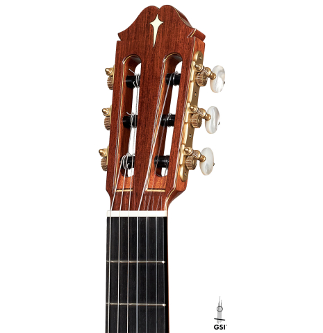The headstock of a 2023 Masaki Sakurai "PC" classical guitar made with spruce and CSA rosewood on a white background.