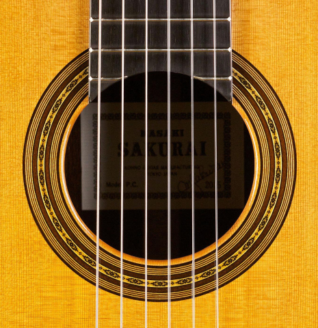 The rosette of a 2015 Masaki Sakurai "PC" classical guitar made of cedar and CSA rosewood