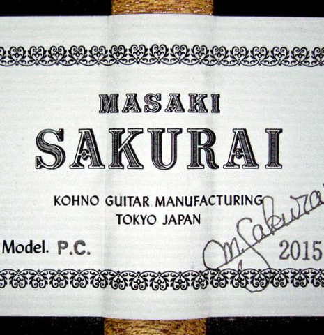 The label of a 2015 Masaki Sakurai "PC" classical guitar made of cedar and CSA rosewood