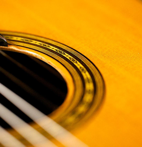 Detail of the rosette of a 2015 Masaki Sakurai "PC" classical guitar made of cedar and CSA rosewood