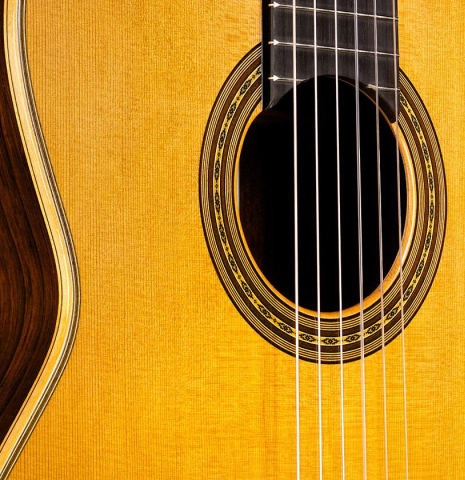 The soundboard of a 2015 Masaki Sakurai "PC" classical guitar made of cedar and CSA rosewood