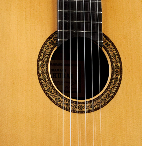 The soundboard of a 2023 Masaki Sakurai "Concert-R" classical guitar made with spruce and Indian rosewood.