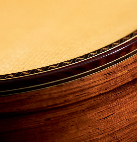 The top, side, purfling and binding of a 2023 Masaki Sakurai "Special" classical guitar made with spruce and CSA rosewood.