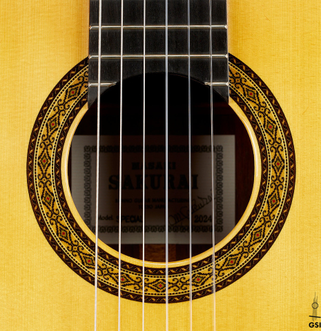 The rosette of a 2024 Masaki Sakurai "Special" classical guitar made with spruce and African rosewood.