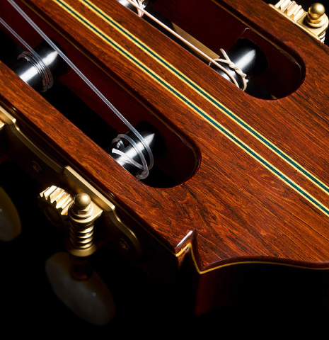 The headstock veneer with inlays and tuning machines of a 2025 Masaki Sakurai "Special" classical guitar made with spruce and African rosewood.