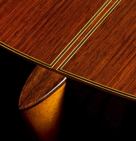 The heel, back binding and purfling of a 2025 Masaki Sakurai "Special" classical guitar made with spruce and African rosewood.