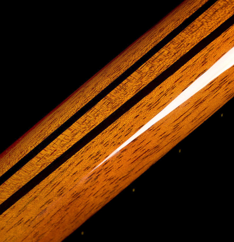 The ebony neck reinforcements of a 2025 Masaki Sakurai "Special" classical guitar made with spruce and African rosewood.