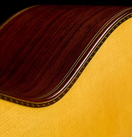 The top binding and purfling of a 2025 Masaki Sakurai "Special" classical guitar made with spruce and African rosewood.