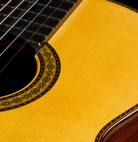 The soundboard of a 2025 Masaki Sakurai "Special" classical guitar made with spruce and African rosewood.