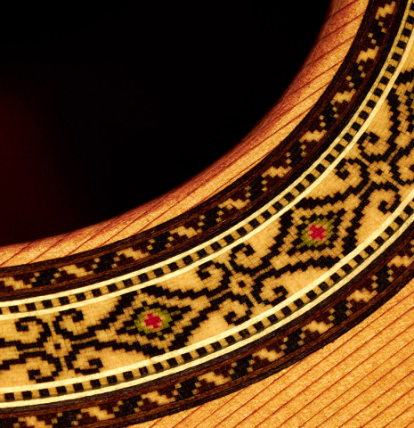 The close-up of a rosette of 2022 Masaki Sakurai "Concert-R 640" classical guitar made with cedar and Indian rosewood