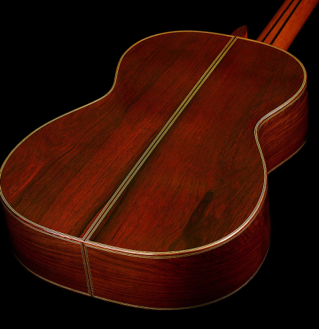 The back and sides of a 2024 Masaki Sakurai "Special 640" classical guitar made of cedar and African rosewood