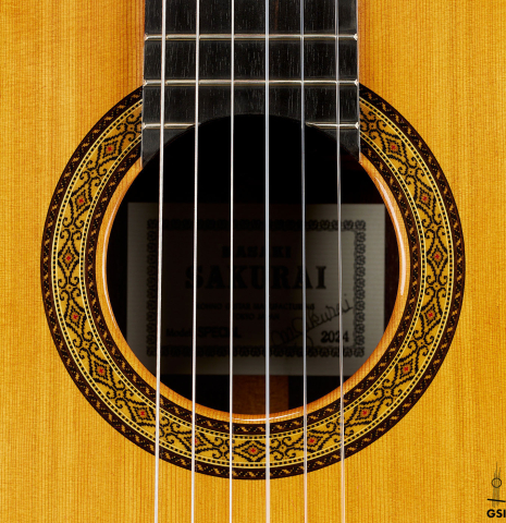 The rosette of a 2024 Masaki Sakurai "Special 640" classical guitar made of cedar and African rosewood