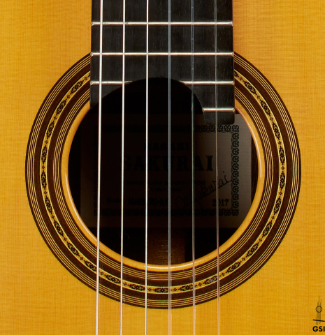 The rosette of a 2017 Masaki Sakurai "Maestro RF" classical guitar made of spruce and African rosewood