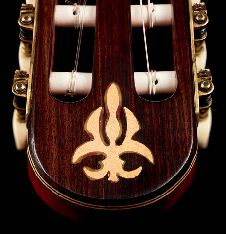 The ornamented headstock of a 2012 Arturo Sanzano &quot;Concierto&quot; classical guitar made with spruce and Indian rosewood