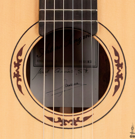 The rosette of a 2012 Arturo Sanzano &quot;Concierto&quot; classical guitar made with spruce and Indian rosewood