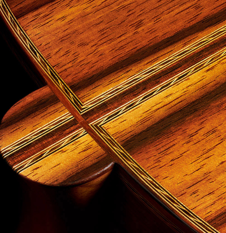 The back, heel, bindings and purflings of a 2022 Adrien Savary Freestone "Garcia" classical guitar made of spruce and CSA rosewood