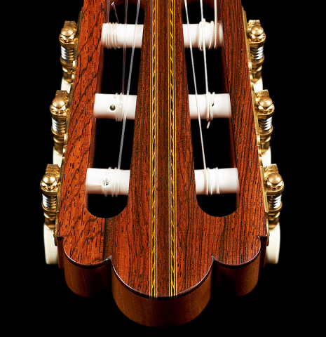 The headstock with inlays and tuning machines of a 2022 Adrien Savary Freestone "Garcia" classical guitar made of spruce and CSA rosewood