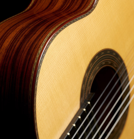 The soundboard and sides of a 2022 Adrien Savary Freestone "Garcia" classical guitar made of spruce and CSA rosewood
