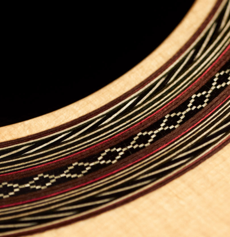 The rosette of a 2008 David Schramm "Hauser" made with spruce and Indian rosewood.