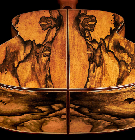 The back and sides at the foot of a 2023 Christoph Sembdner classical guitar made of cedar and exotic ebony