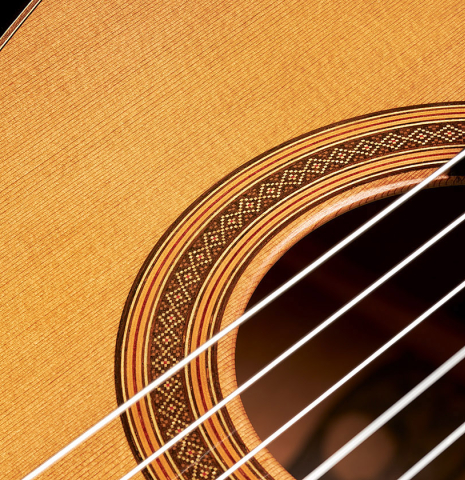 Detail of the rosette of a 2023 Christoph Sembdner classical guitar made of cedar and exotic ebony