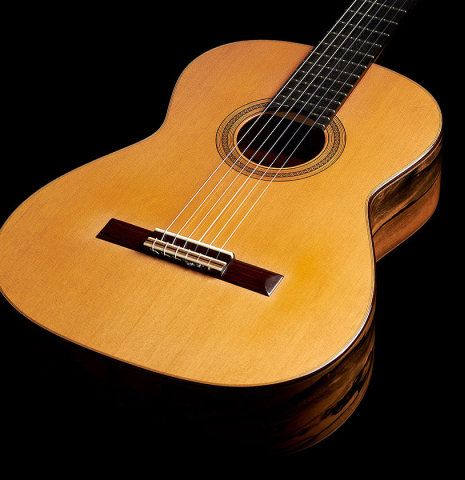 The soundboard and sides of a 2023 Christoph Sembdner classical guitar made of cedar and exotic ebony