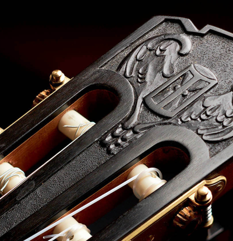 The carved headstock of a 2016 Federico Sheppard “Simplicio 1927, ex Barrios” (ex Pavel Steidl) classical guitar made with spruce and CSA rosewood