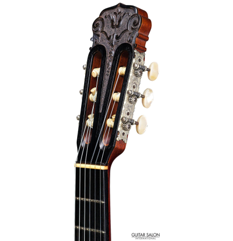 The headstock of a 1925 Francisco Simplicio made with spruce and CSA rosewood.