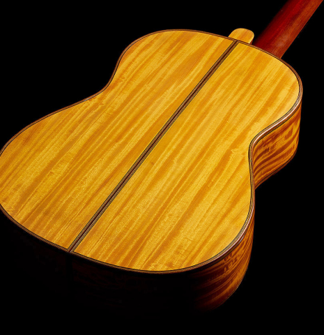 The back and sides of a 1929 Francisco Simplicio classical guitar made of spruce and satinwood