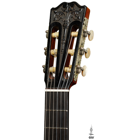 The headstock of a 1929 Francisco Simplicio classical guitar made of spruce and satinwood