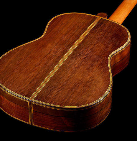 The back and sides of a 1923 Francisco Simplicio classical guitar made of spruce and CSA rosewood