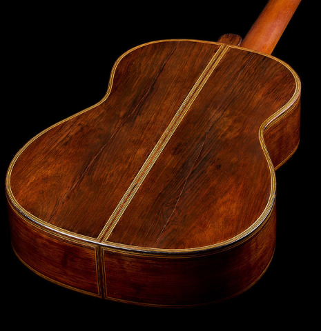 The back and sides of a 1926 Francisco Simplicio classical guitar made of spruce and CSA rosewood