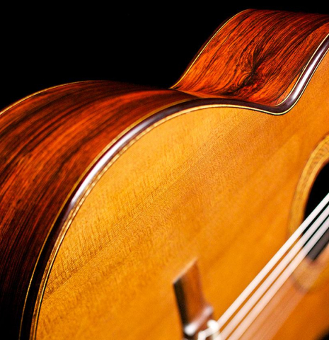 The side and binding of a 1992 Greg Smallman made with cedar and CSA rosewood.