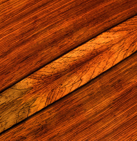 The back of a 1999 Greg Smallman classical guitar made of cedar and CSA rosewood
