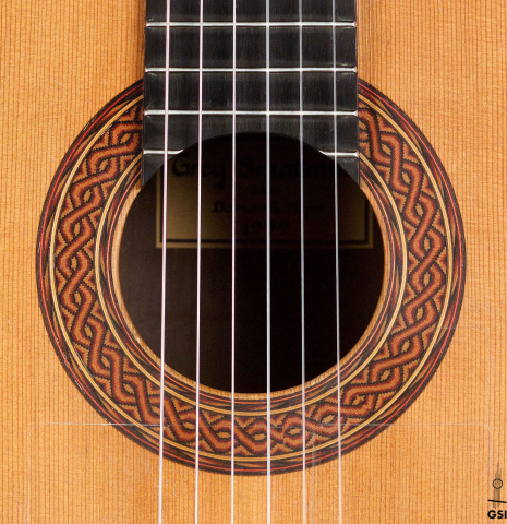 The rosette of a 1999 Greg Smallman classical guitar made of cedar and CSA rosewood