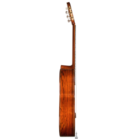 The side of a 1999 Greg Smallman classical guitar made of cedar and CSA rosewood