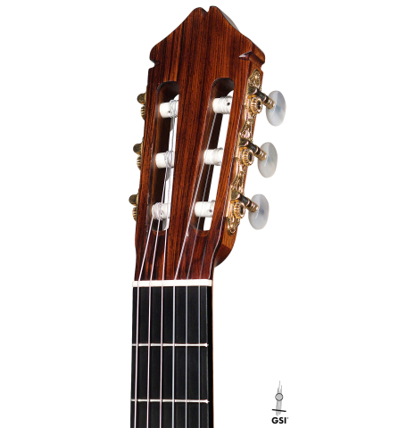 The headstock of a 1999 Greg Smallman classical guitar made of cedar and CSA rosewood
